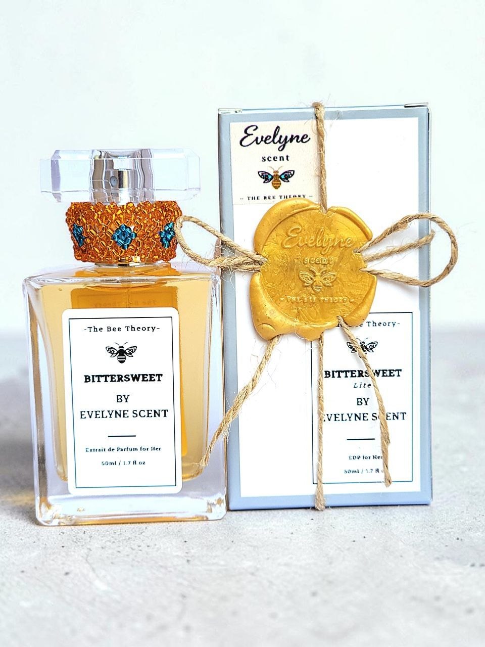 Evelyne Scent 50ml Ethanol-free, alcohol-free, eau de parfum non-greasy sprayable oil perfume with beaded cap and black box packaging with white box, wax seal and jute twine bow
